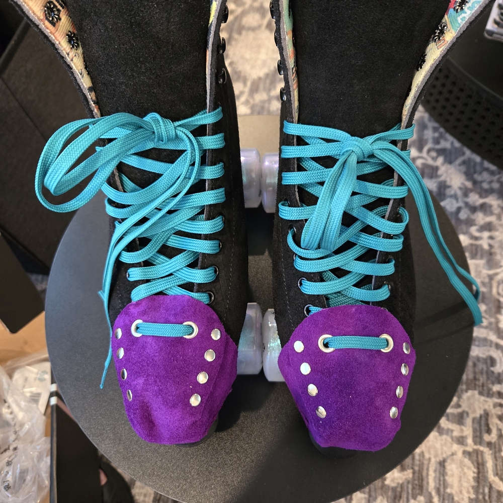 Stylish Black and Purple Roller Skates